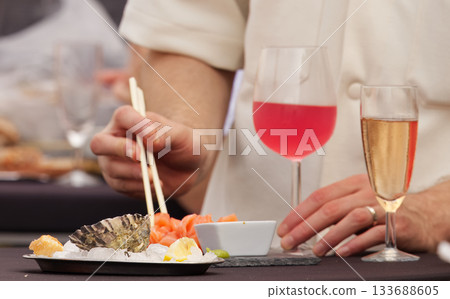Oysters on ice with wine and sashimi Oysters on ice with wine and sashimi 133688605