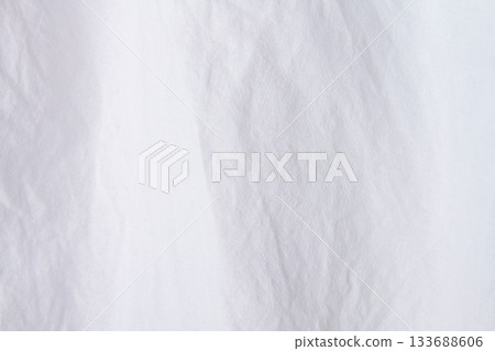Texture of white fabric. White background close up. Factory fabric in white. Texture of white fabric. White background close up. Factory fabric in white. 133688606