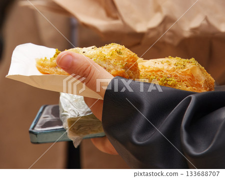 Baklava and modern lifestyle at Naplavka farmers market in Prague Baklava and modern lifestyle at Naplavka farmers market in Prague 133688707