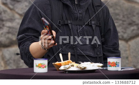 Seafood lunch and digital moment at farmers market Seafood lunch and digital moment at farmers market 133688712