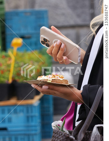 Snack and smartphone at Naplavka market Snack and smartphone at Naplavka market 133688747