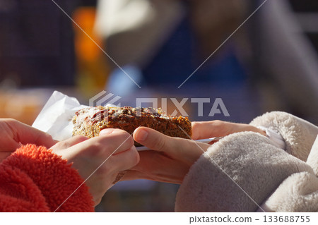 Sharing a Moment in the Autumn Sun at Naplavka Market 133688755