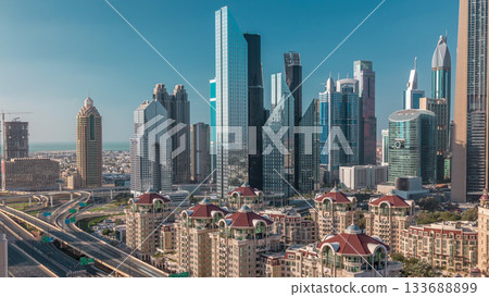 Aerial view of skyscrapers and road junction in Dubai timelapse Aerial view of skyscrapers and road junction in Dubai timelapse 133688899