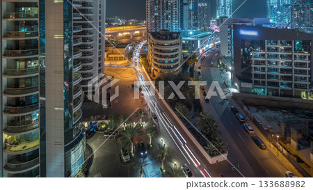 Dubai Marina skyscrapers and promenade aerial night timelapse, Dubai, United Arab Emirates 133688982