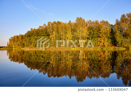 Tranquil River Reflections of Autumn Trees Tranquil River Reflections of Autumn Trees 133689047