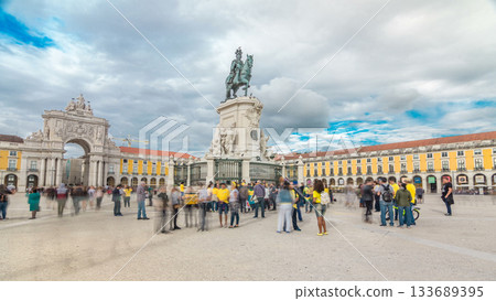 Bronze statue of King Jose I and triumphal arch at Rua Augusta at Commerce square timelapse hyperlapse in Lisbon, Portugal. 133689395