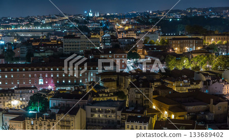 Lisbon aerial view of city centre with illuminated building at night timelapse, Portugal Lisbon aerial view of city centre with illuminated building at night timelapse, Portugal 133689402