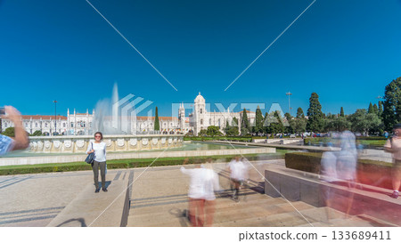 Jeronimos monastery and fountain seen from the Imperio garden timelapse hyperlapse in Lisbon, Portugal. Jeronimos monastery and fountain seen from the Imperio garden timelapse hyperlapse in Lisbon, Portugal. 133689411
