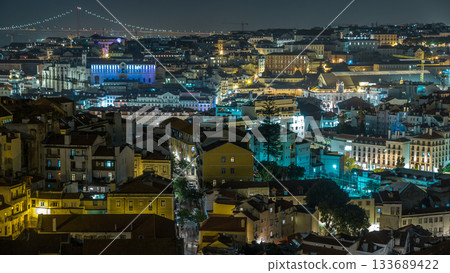 Lisbon aerial view of city centre with illuminated building at night timelapse, Portugal Lisbon aerial view of city centre with illuminated building at night timelapse, Portugal 133689422