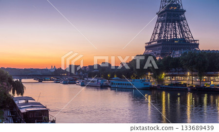 Eiffel Tower and the Seine river night to day timelapse, Paris, France Eiffel Tower and the Seine river night to day timelapse, Paris, France 133689439
