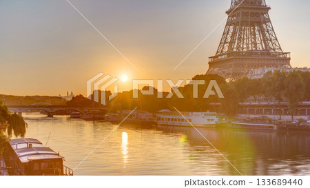 Eiffel Tower and the Seine river at Sunrise timelapse, Paris, France Eiffel Tower and the Seine river at Sunrise timelapse, Paris, France 133689440