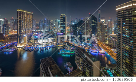 Night illumination of Dubai Marina aerial timelapse, UAE. 133689566