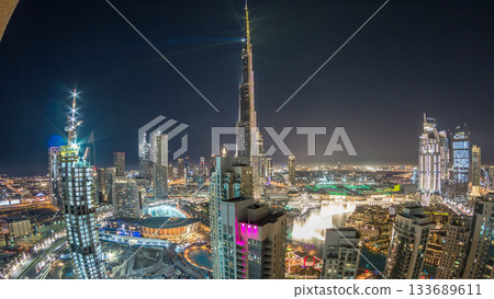 Dubai downtown cityscape with Burj Khalifa, LightUp light show aerial timelapse Dubai downtown cityscape with Burj Khalifa, LightUp light show aerial timelapse 133689611