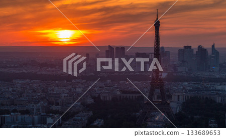 Panorama of Paris at sunset timelapse. Eiffel tower view from montparnasse building in Paris - France 133689653