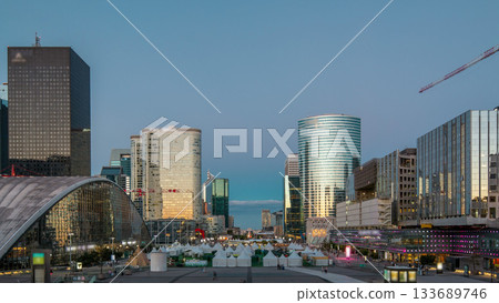 The stunning Defence Parisian business district bristling with skyscrapers day to night timelapse. 133689746