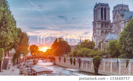 Sunset view of Cathedral Notre Dame de Paris timelapse in Paris, France. 133689757