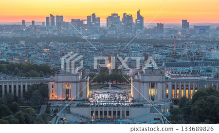 Aerial view over Trocadero day to night timelapse with the Palais de Chaillot seen from the Eiffel Tower in Paris, France. 133689826