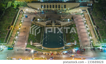 Aerial Night timelapse view of Paris City and Seine river shot on the top of Eiffel Tower 133689828