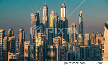 Aerial top view at sunset timelapse of Dubai Marina and JLT in Dubai, UAE 133689855