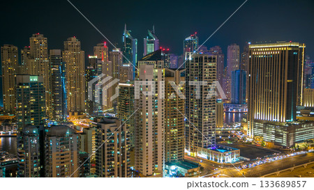 Aerial top view at night timelapse of Dubai Marina in Dubai, UAE Aerial top view at night timelapse of Dubai Marina in Dubai, UAE 133689857