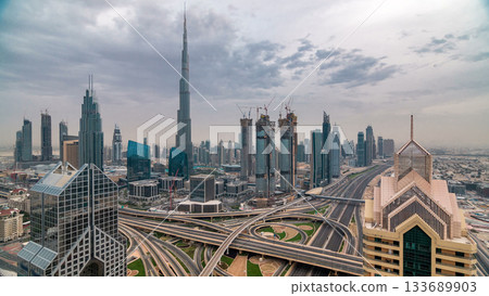 Dubai skyline timelapse at sunset with city center skyscrapers and Sheikh Zayed road traffic, Dubai, United Arab Emirates Dubai skyline timelapse at sunset with city center skyscrapers and Sheikh Zayed road traffic, Dubai, United Arab Emirates 133689903