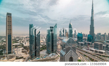Dubai skyline timelapse at sunset with city center skyscrapers and Sheikh Zayed road traffic, Dubai, United Arab Emirates 133689904