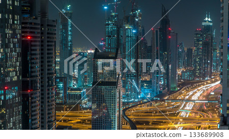 Dubai Downtown timelapse top view at night as shot from a rooftop viewpoint. Dubai, UAE Dubai Downtown timelapse top view at night as shot from a rooftop viewpoint. Dubai, UAE 133689908