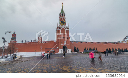 View of The Saviour Spasskaya Tower timelapse hyperlapse and Kremlin walls of Moscow Kremlin, Russia at day in winter. 133689934