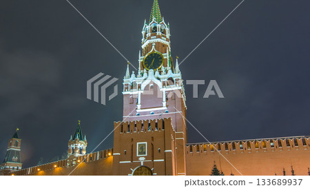 View of The Saviour Spasskaya Tower timelapse hyperlapse and Kremlin walls of Moscow Kremlin, Russia at night in winter. 133689937