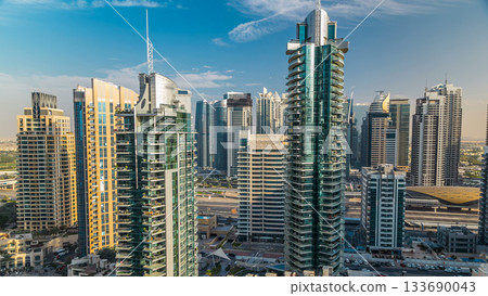 Aerial view timelapse of Dubai Marina at day time in Dubai, UAE 133690043
