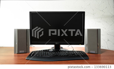 Work desk for digital job with computer, audio speakers and keyboard timelapse hyperlapse 133690113