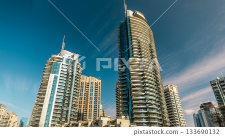 Dubai Marina towers in Dubai at day time timelapse Dubai Marina towers in Dubai at day time timelapse 133690132