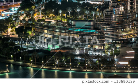 A general view of the bridge over man-made lake timelapse in Dubai downtown, United Arab Emirates. 133690159