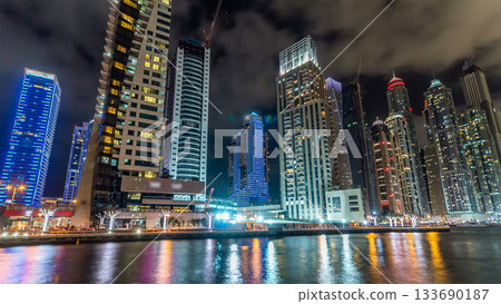 Dubai Marina towers and canal in Dubai night timelapse hyperlapse Dubai Marina towers and canal in Dubai night timelapse hyperlapse 133690187