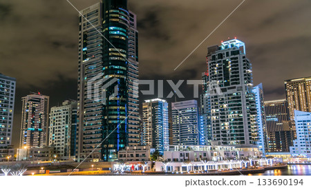 Dubai Marina towers and canal in Dubai night timelapse Dubai Marina towers and canal in Dubai night timelapse 133690194