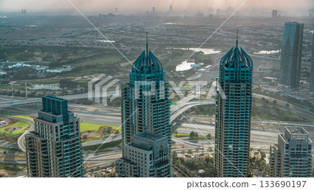 Morning in Dubai Marina with towers and traffic on road from skyscraper, Dubai, UAE timelapse Morning in Dubai Marina with towers and traffic on road from skyscraper, Dubai, UAE timelapse 133690197