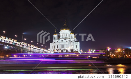 Majestic orthodox Cathedral of Christ Saviour and bridge at dusk on bank of Moscow river. Timelapse hyperlapse, Russia 133690242