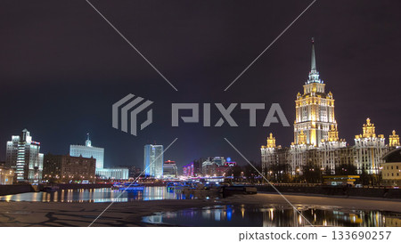 Hotel Ukraine winter night timelapse hyperlapse with bridge over Moscow River. 133690257