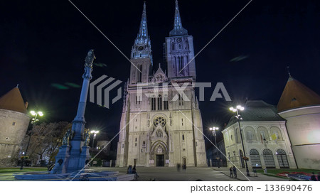 Entrance to Zagreb Cathedral night timelapse hyperlapse and Monument called Maria's pillar. ZAGREB, CROATIA Entrance to Zagreb Cathedral night timelapse hyperlapse and Monument called Maria's pillar. ZAGREB, CROATIA 133690476