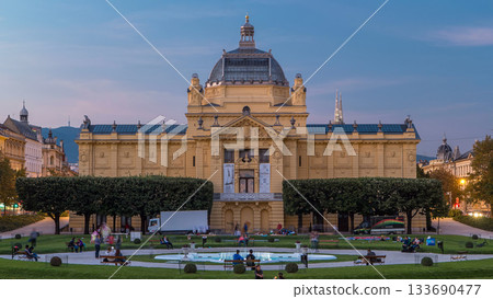 Day to night timelapse view of Art pavilion at King Tomislav square in Zagreb, Croatia. Day to night timelapse view of Art pavilion at King Tomislav square in Zagreb, Croatia. 133690477