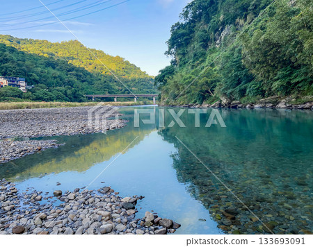 Clear Blue Green Water of Wulai River and Bridge in New Taipei City Taiwan. 133693091