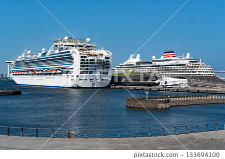 Asuka III and Diamond Princess moored side by side at Osanbashi Pier in Yokohama 133694100