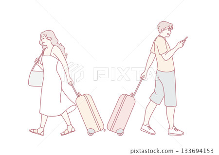 emotional parting between travelers at terminal, tense farewell as two travelers depart with luggage, couple shares emotional farewell at airport departure area while pulling suitcases emotional parting between travelers at terminal, tense farewell as two travelers depart with luggage, couple shares emotional farewell at airport departure area while pulling suitcases 133694153