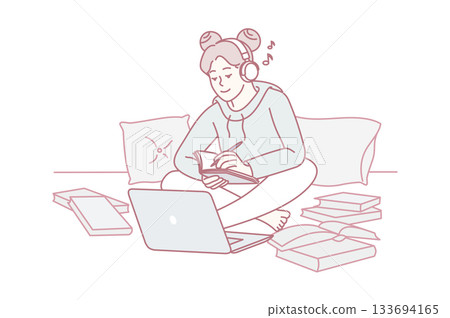 Relaxed evening learning environment, Focused student engaged in late night exam preparation at home 133694165