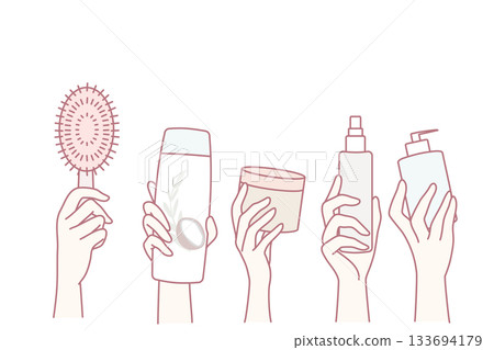 Hands holding diverse cosmetic bottle 133694179