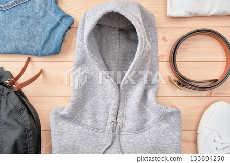 Sweatshirts and accessories on the floor Sweatshirts and accessories on the floor 133694250
