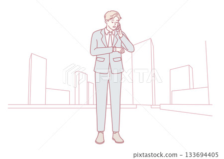 Confident professional in tailored attire conducts business call amidst bustling downtown environment 133694405