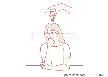 Pensive businesswoman with lightbulb above head 133694606