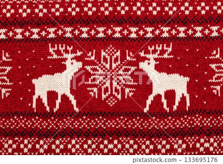 Close-up of red Nordic sweater with reindeer and snowflake 133695176