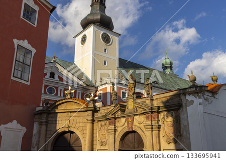 Broumov Monastery clock tower and baroque gate Broumov Monastery clock tower and baroque gate 133695941